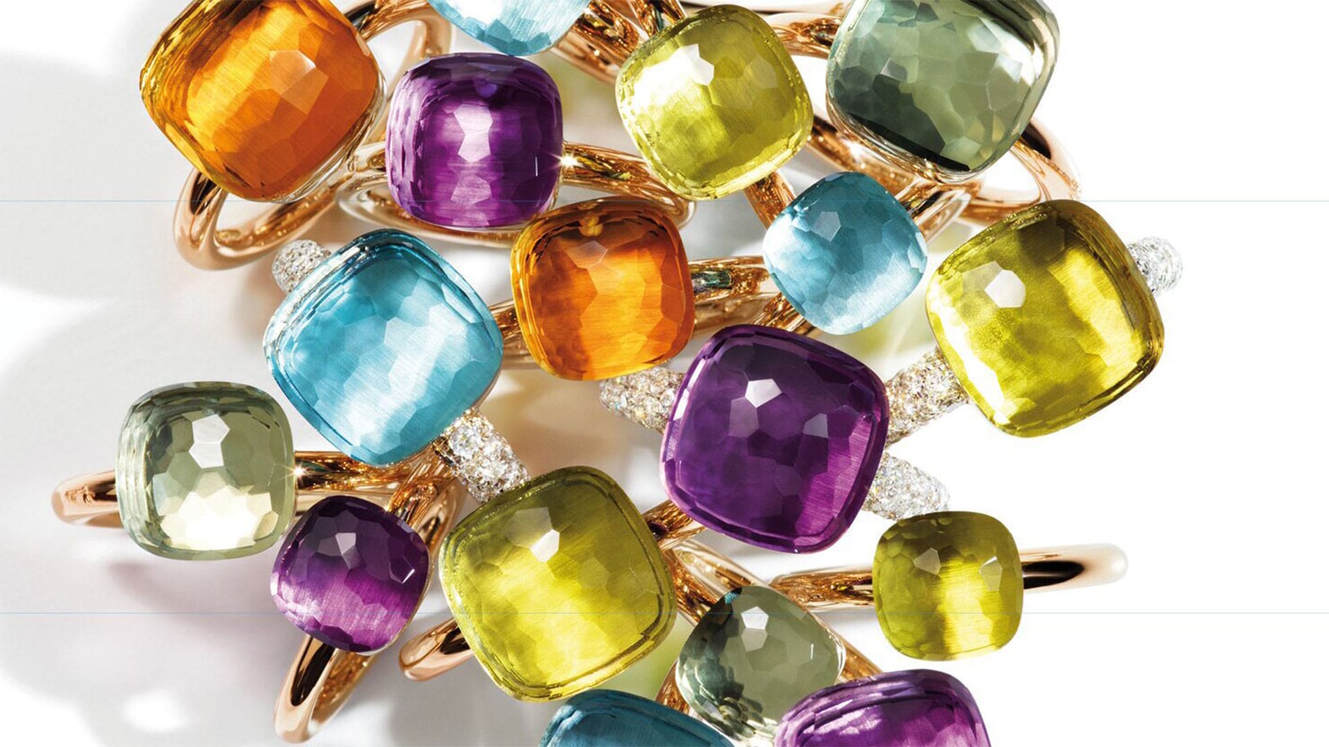 Anting-anting juntai ganda untuk wanita berhiaskan topas biru London karya Pomellato, merek perhiasan berkelas di Singapura