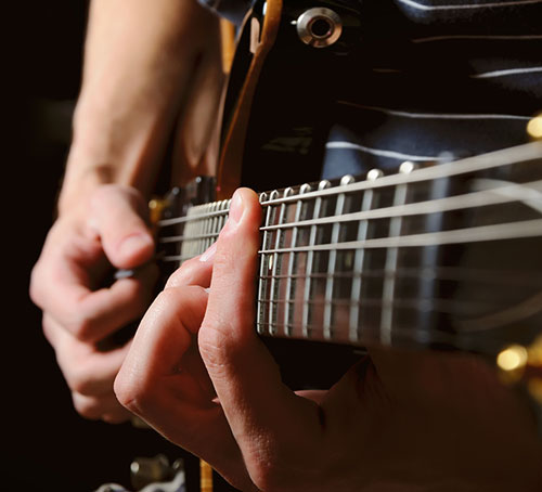 Tangan Bermain Gitar