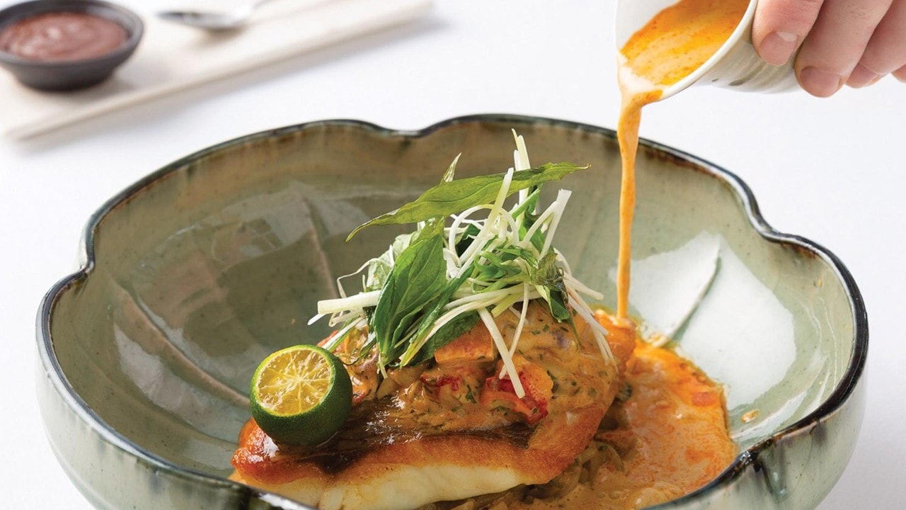 Fish doused with laksa sauce, a popular Singapore local food