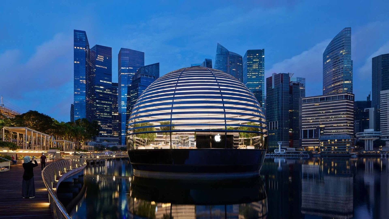 Night view of a floating Apple Store in Singapore