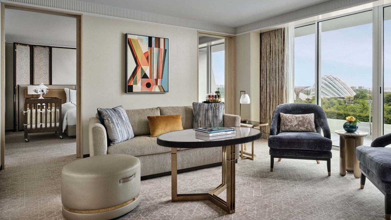 Sands Family Suite, a family hotel room in Singapore with a baby cot