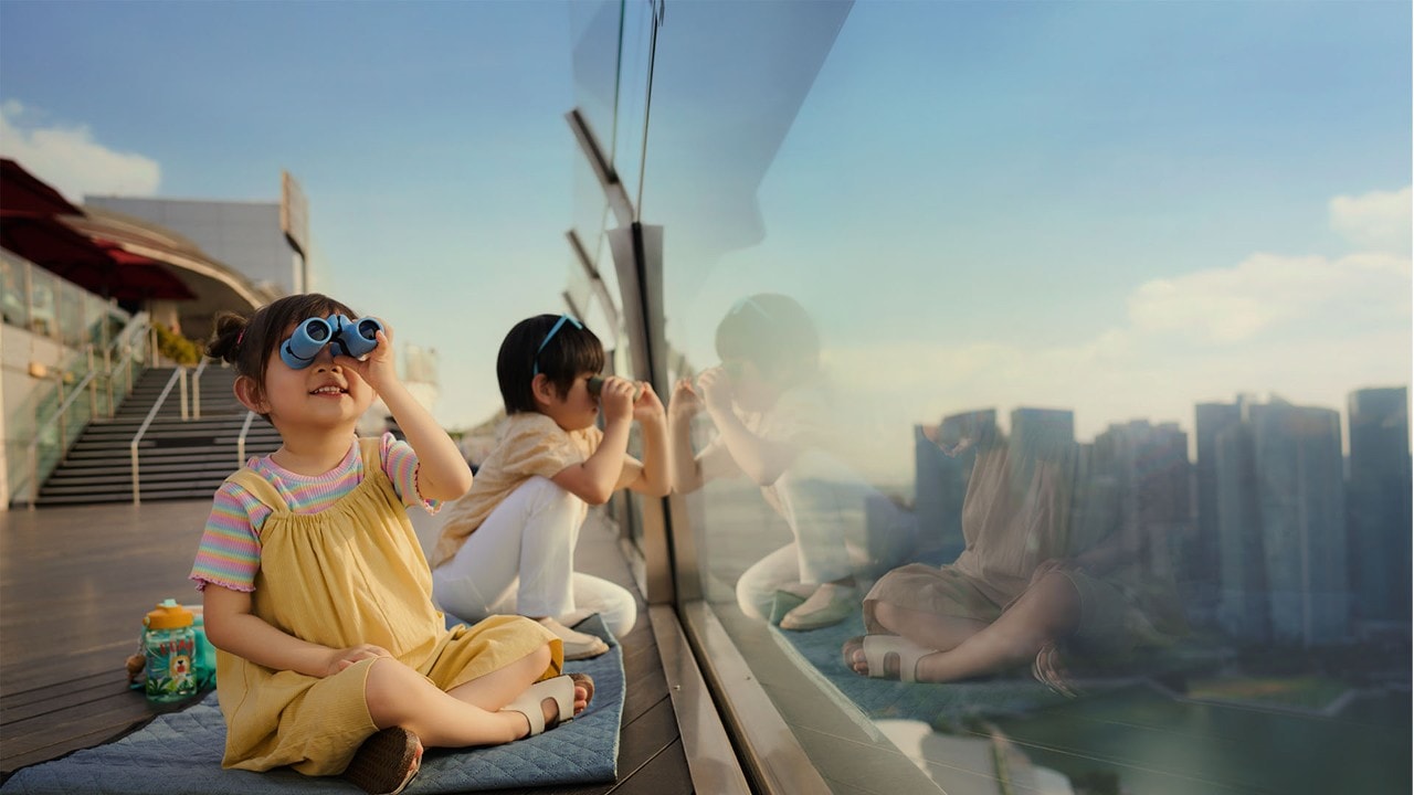 Family at Skypark Observation Deck watching the view